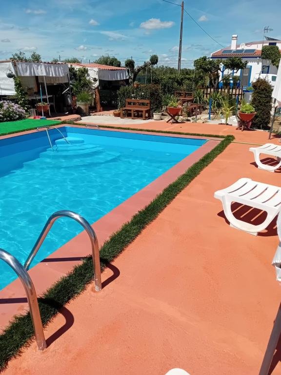 Piscina do Reguengos Hotel no jardim
